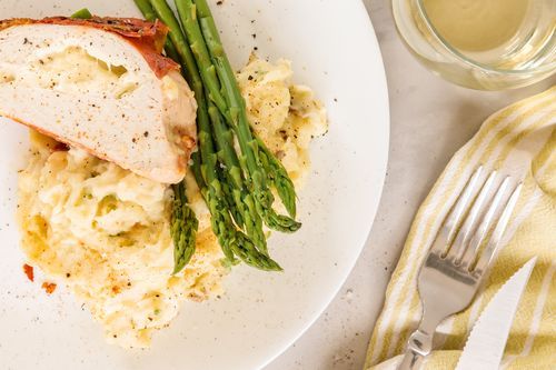 3. Prosciutto-Wrapped Stuffed Chicken with Cheesy Mashed Potatoes 